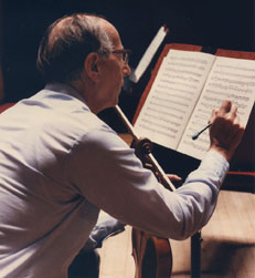 On stage in Philadelphia's Academy of Music during rehearsal. He said that his most important instrument was a pencil with a large eraser on it.